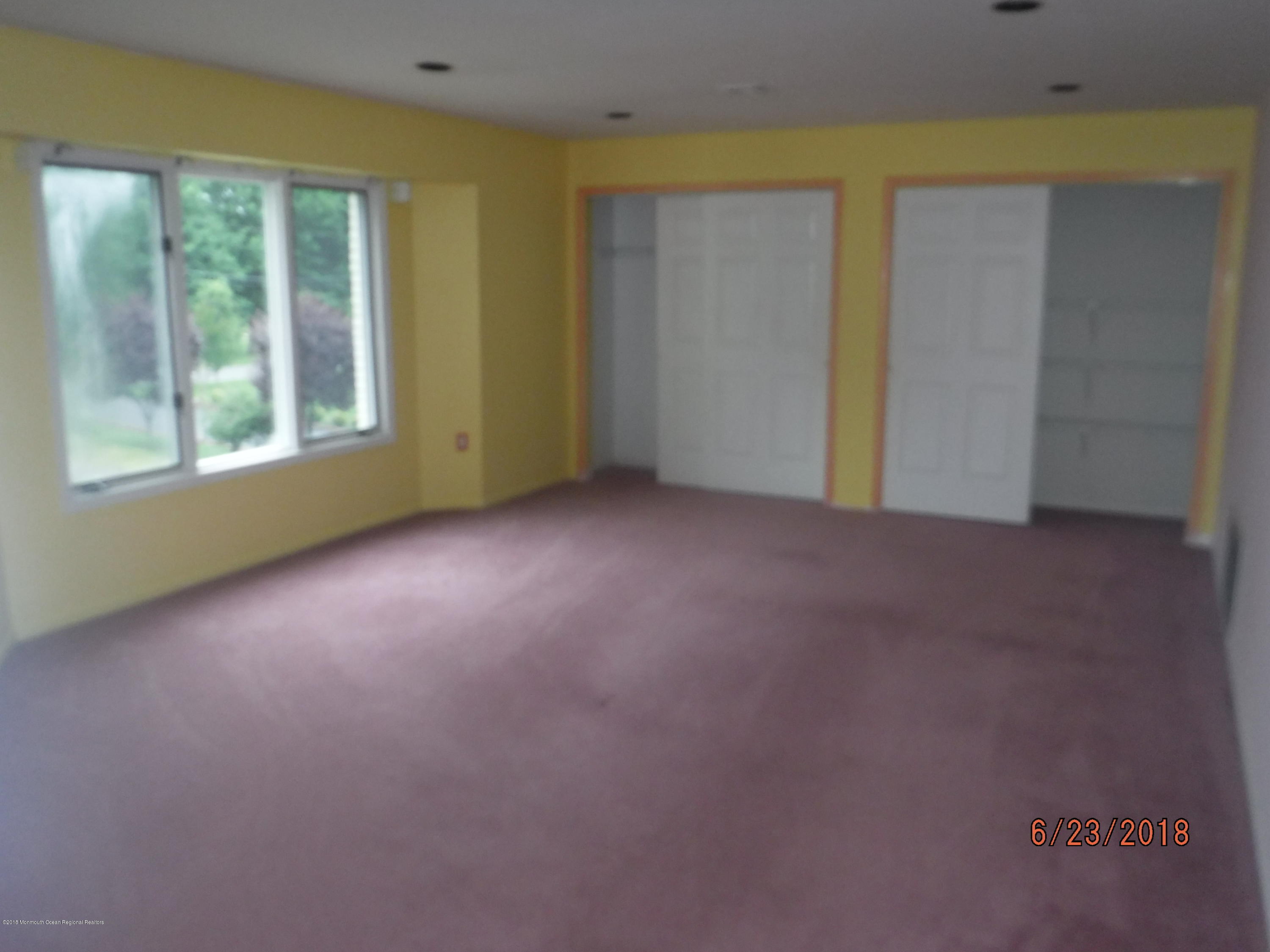 17 Crow Hill Road Freehold, NJ 07728 - Photo 35 of 44 an empty room with windows