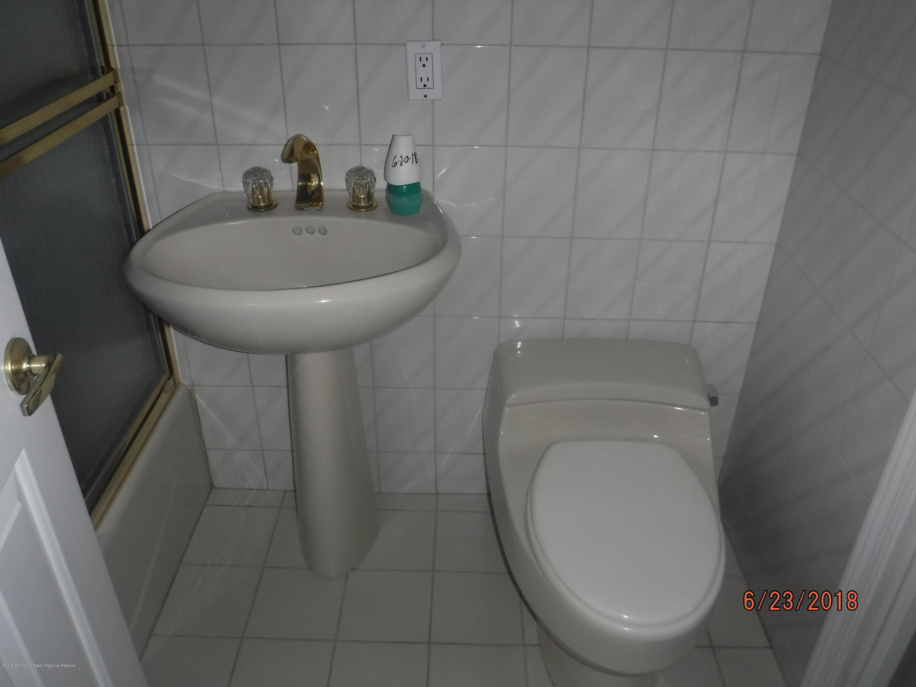 17 Crow Hill Road Freehold, NJ 07728 - Photo 36 of 44 a bathroom with a sink and a mirror