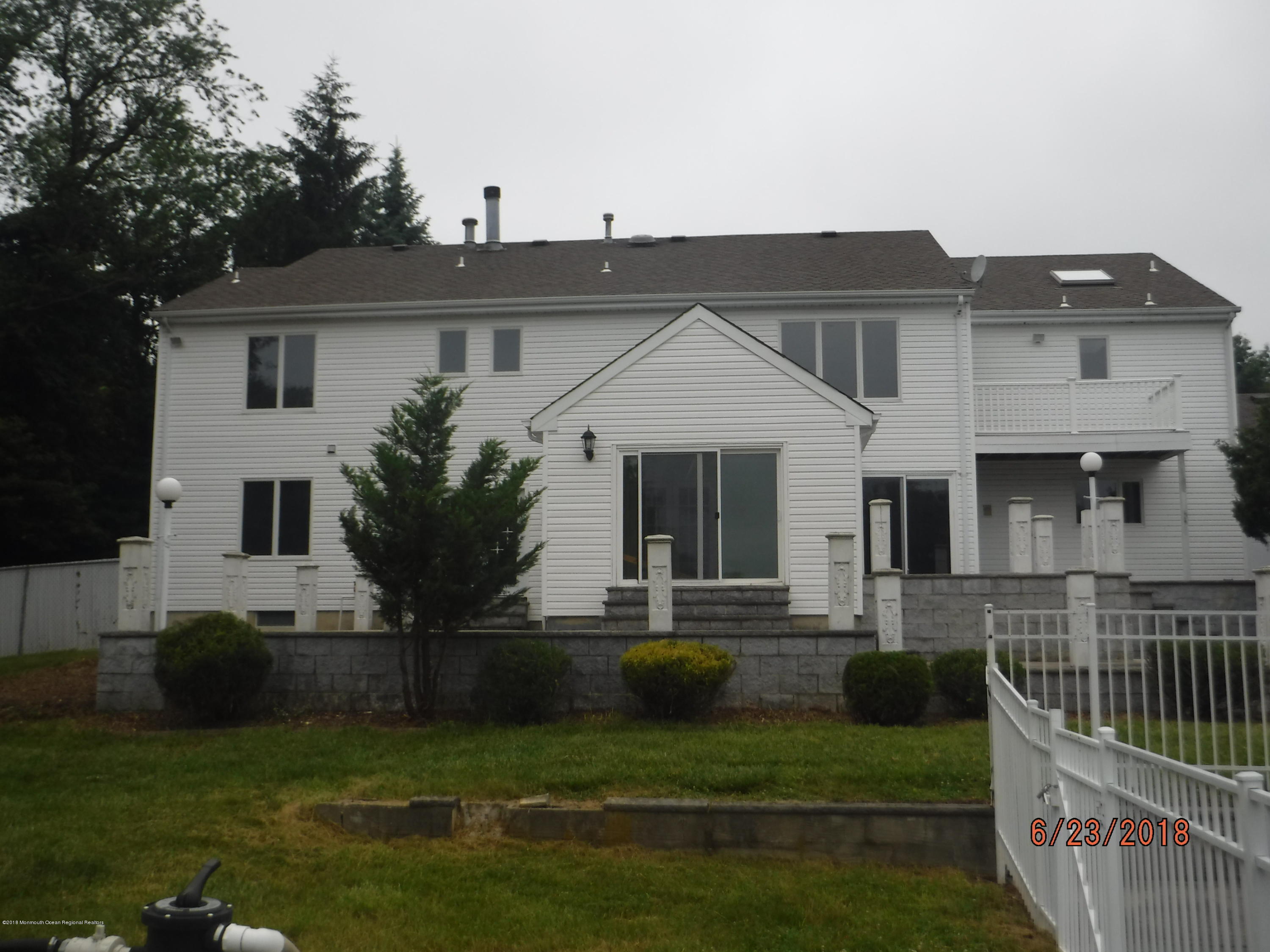 17 Crow Hill Road Freehold, NJ 07728 - Photo 4 of 44 a front view of a house with a yard