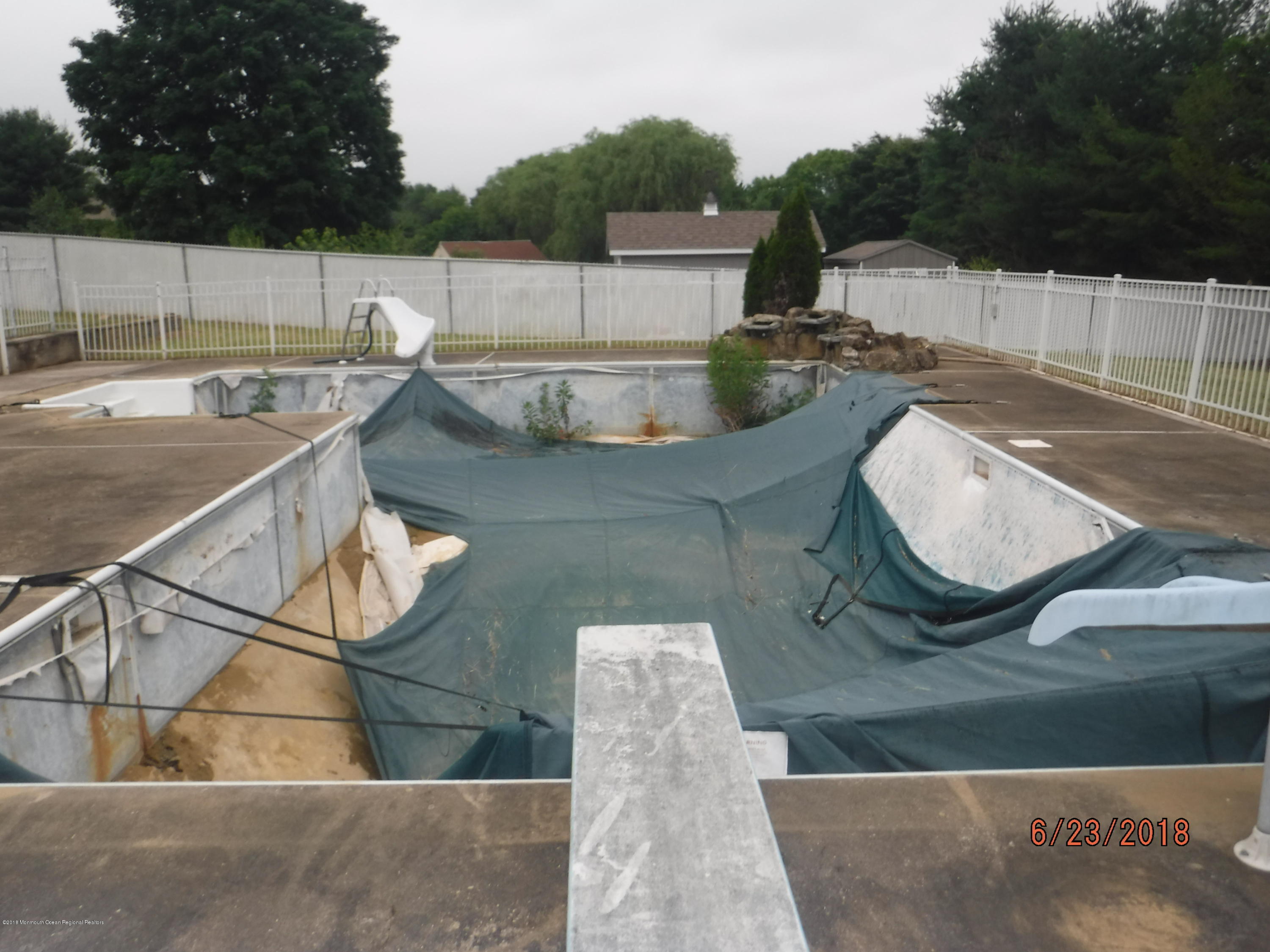 17 Crow Hill Road Freehold, NJ 07728 - Photo 7 of 44 swimming pool view with a sitting space