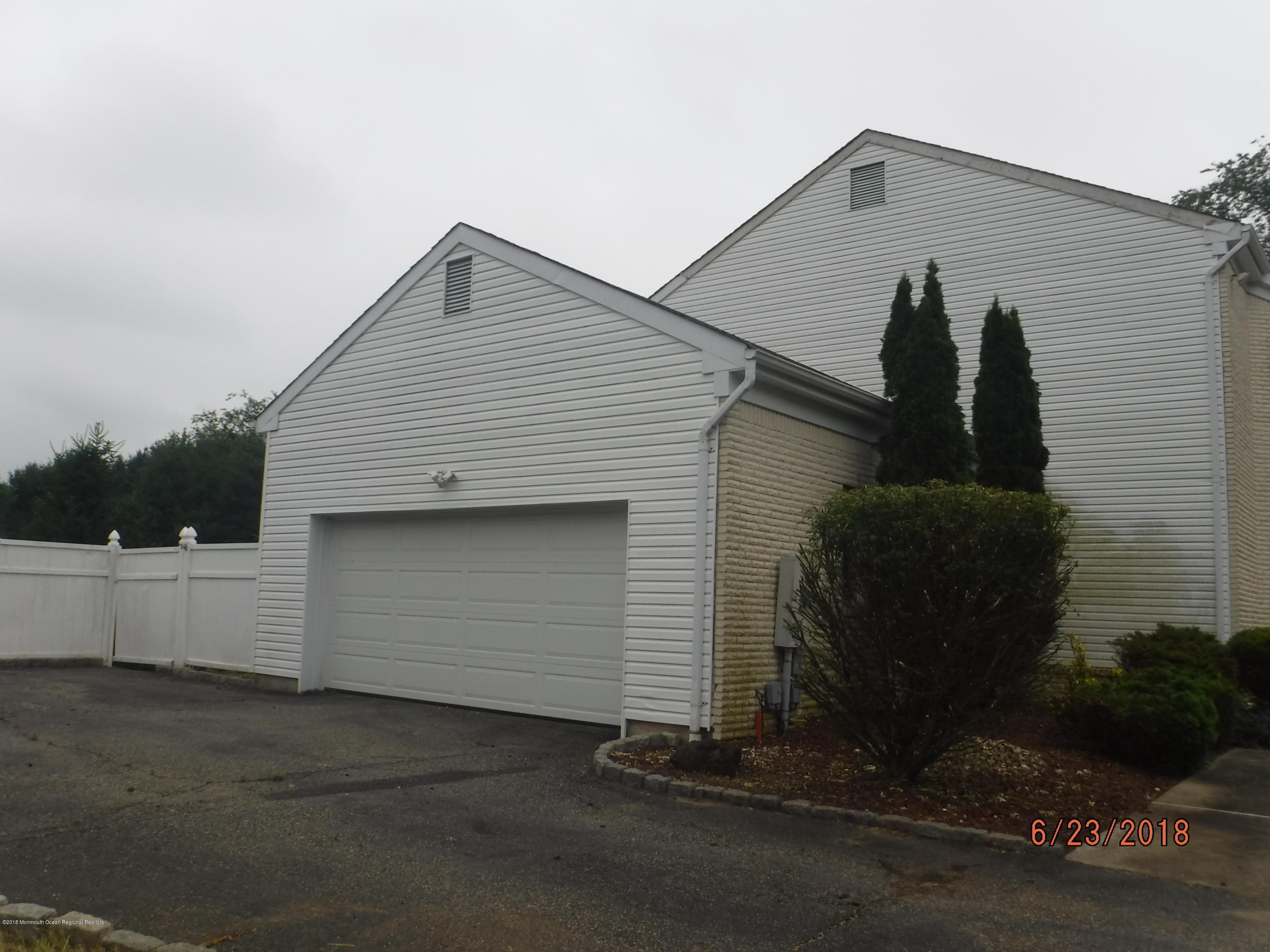 17 Crow Hill Road Freehold, NJ 07728 - Photo 10 of 44 a front view of a house with garden