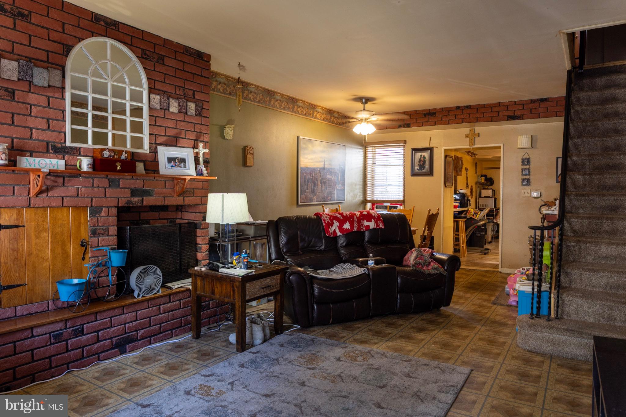 2986 Chatham Street Philadelphia, PA 19134 - Photo 2 of 14 a living room filled with furniture