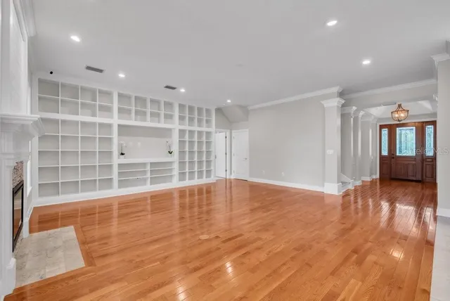 a spacious bathroom with a granite countertop tub sink and mirror