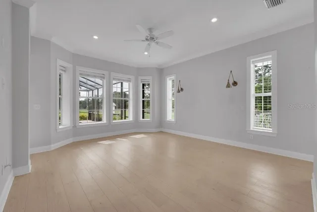 a view of a backyard with a small deck