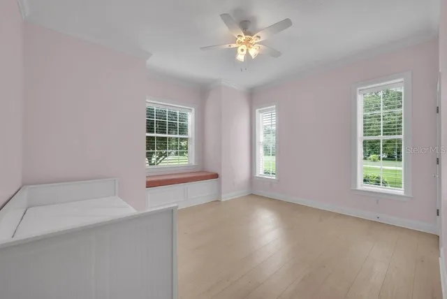 an aerial view of a house with a garden