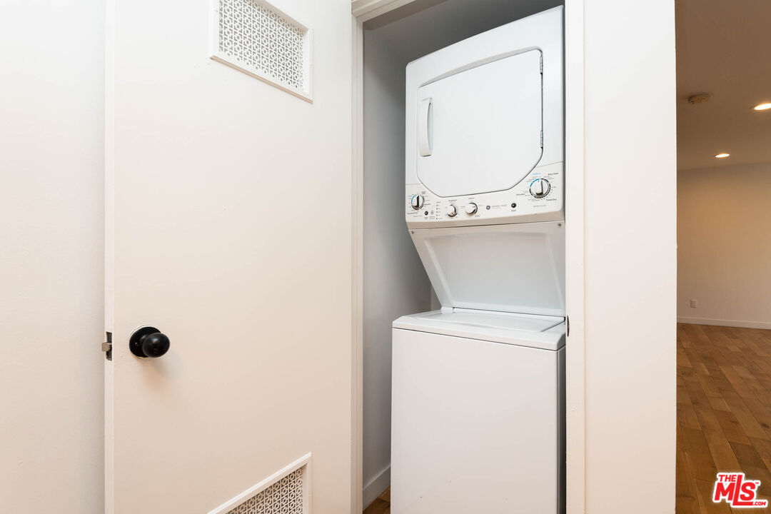 1016 Sanborn Avenue, Unit 101 Los Angeles, CA 90029 - Photo 17 of 18 a close view of a utility room with dryer and washer