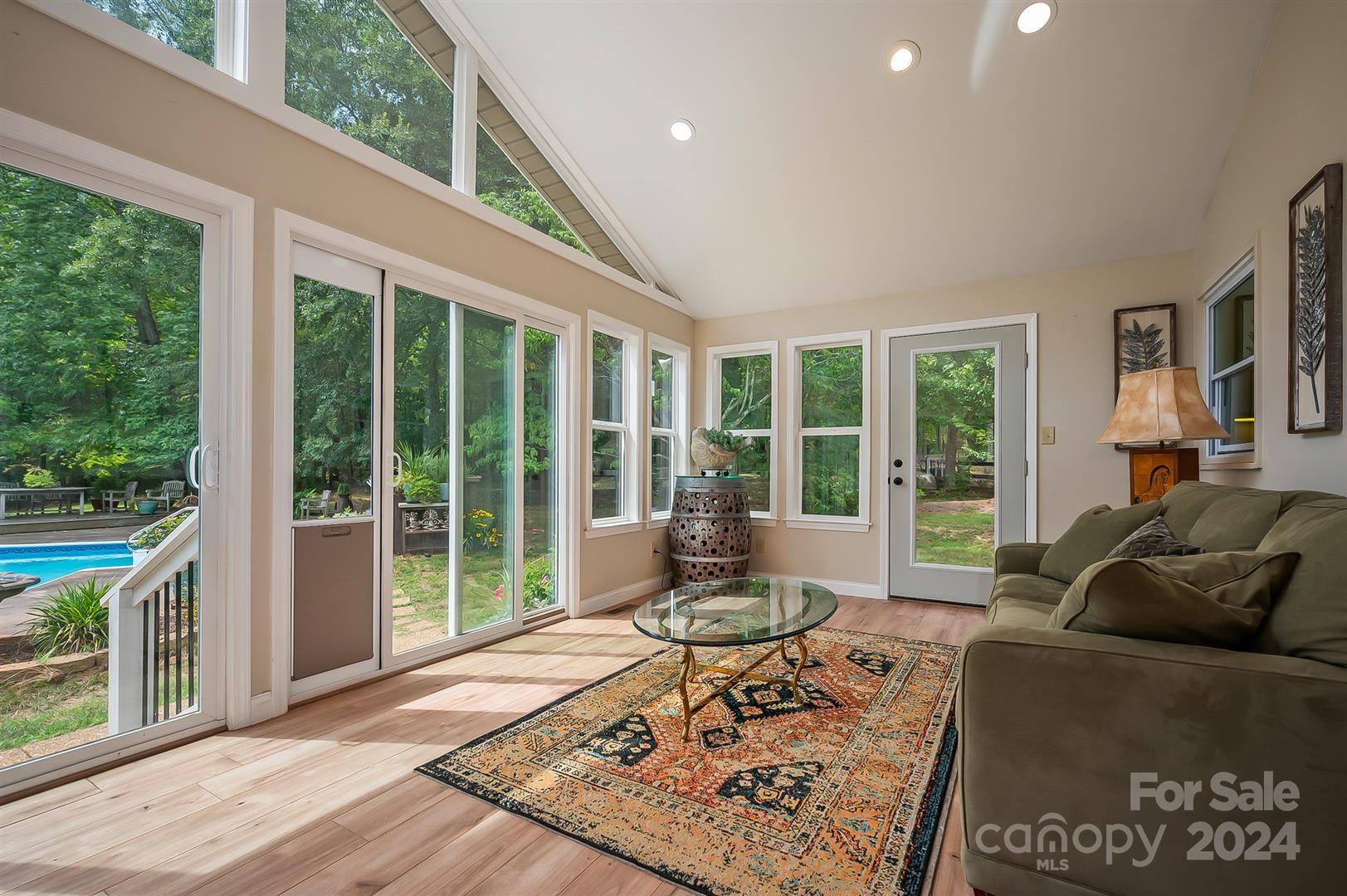 2316 Golf Course Road Columbus, NC 28722 - Photo 14 of 33 a living room with furniture and a large window