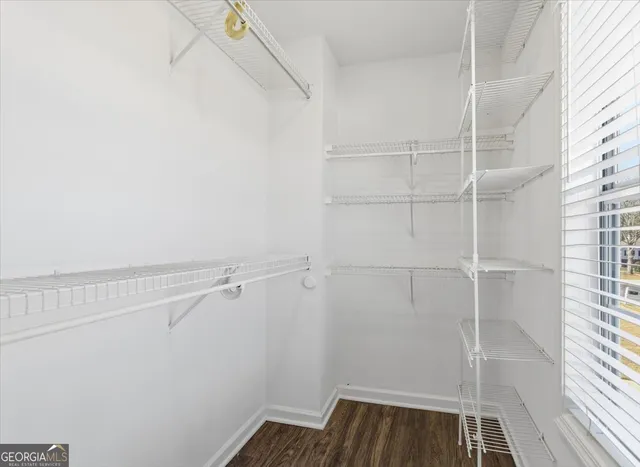 a view of a room with racks on the wall