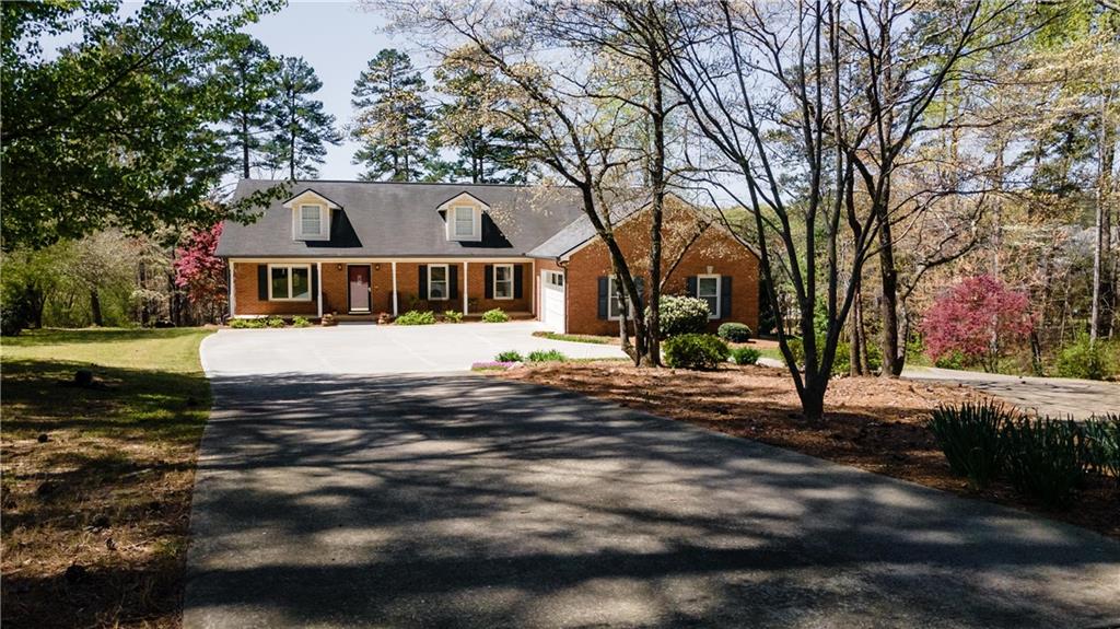 3496 Fate Conn Road Canton, GA 30114 - Photo 1 of 1 A Canton Oasis on 2.2 acre lot.