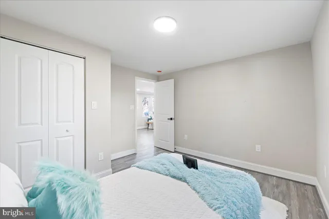 a bedroom with a bed and a cabinets