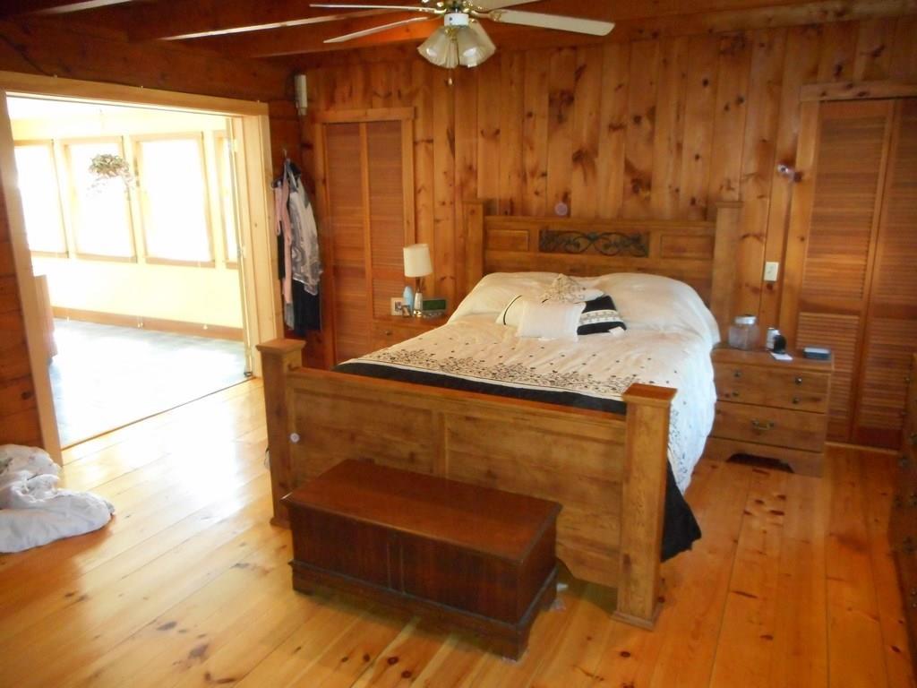 989 Pond Road Gouldsboro, ME 04607 - Photo 7 of 35 Master bedroom and hot tub room.