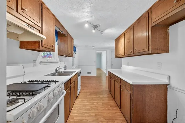 $336,000 | 1075 Westchester Drive Southwest, Lilburn, GA 30047