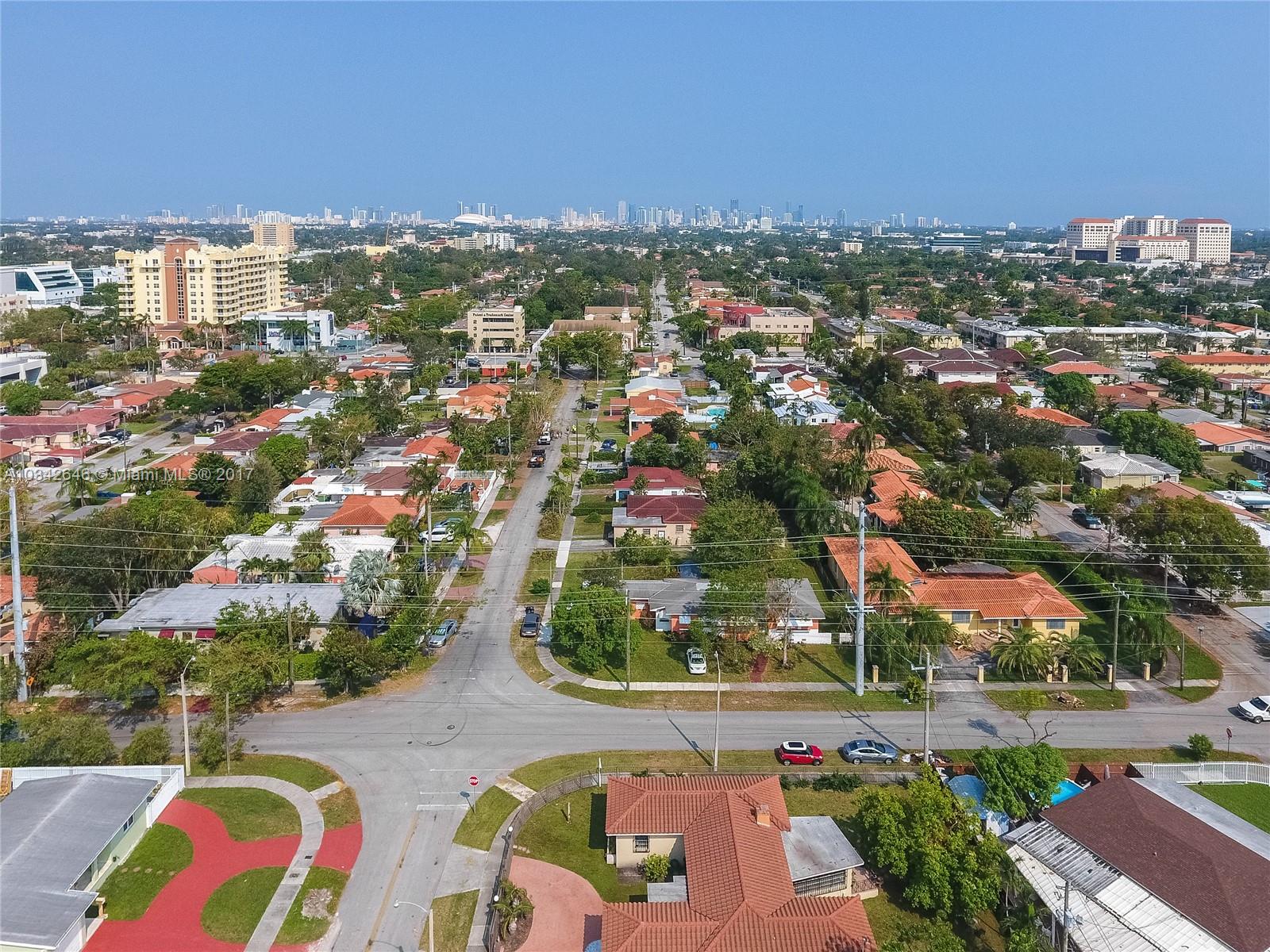 4300 Southwest 3rd Street Miami, FL 33134 - Photo 19 of 21 an aerial view of residential houses with outdoor space and street view