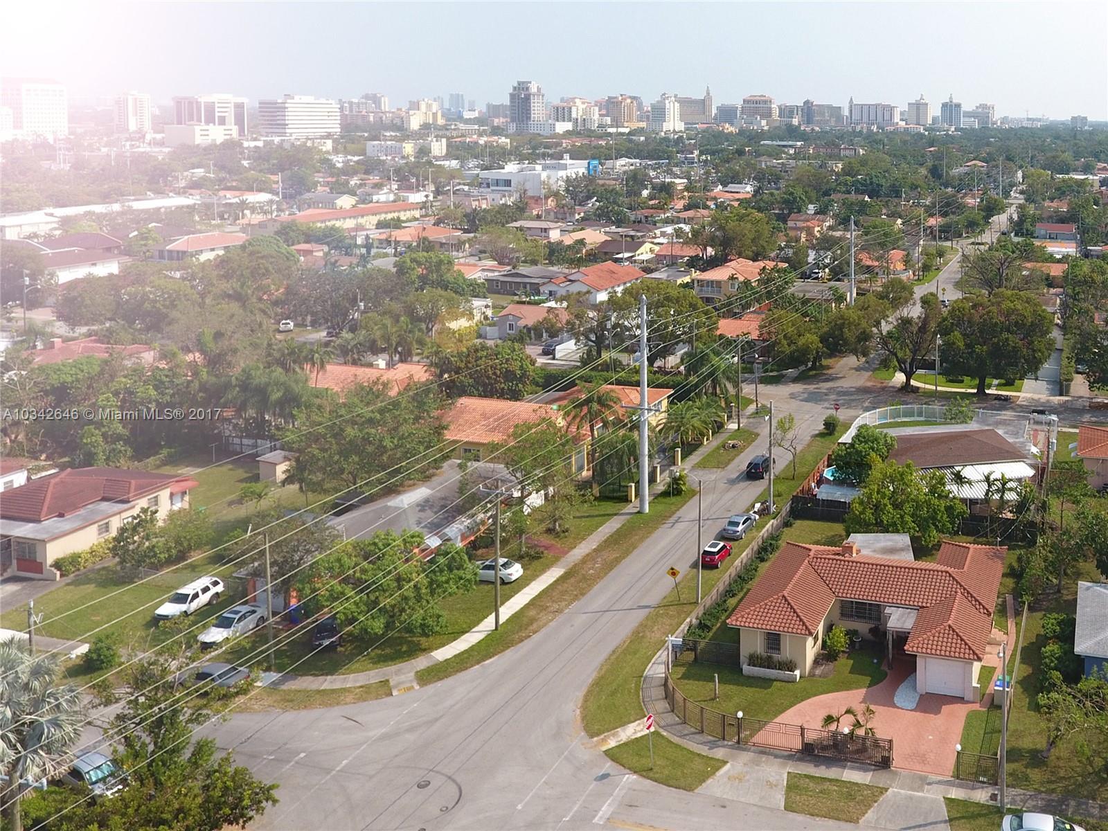 4300 Southwest 3rd Street Miami, FL 33134 - Photo 20 of 21 an aerial view of residential houses with city view