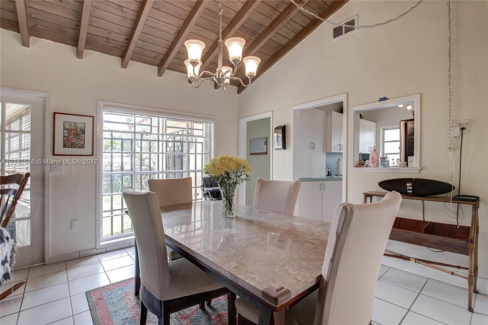 4300 Southwest 3rd Street Miami, FL 33134 - Photo 5 of 21 a view of a dining room with furniture