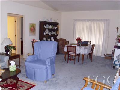 7286 Buchanan Road Fort Myers, FL 33967 - Photo 8 of 9 a dining room with furniture and window