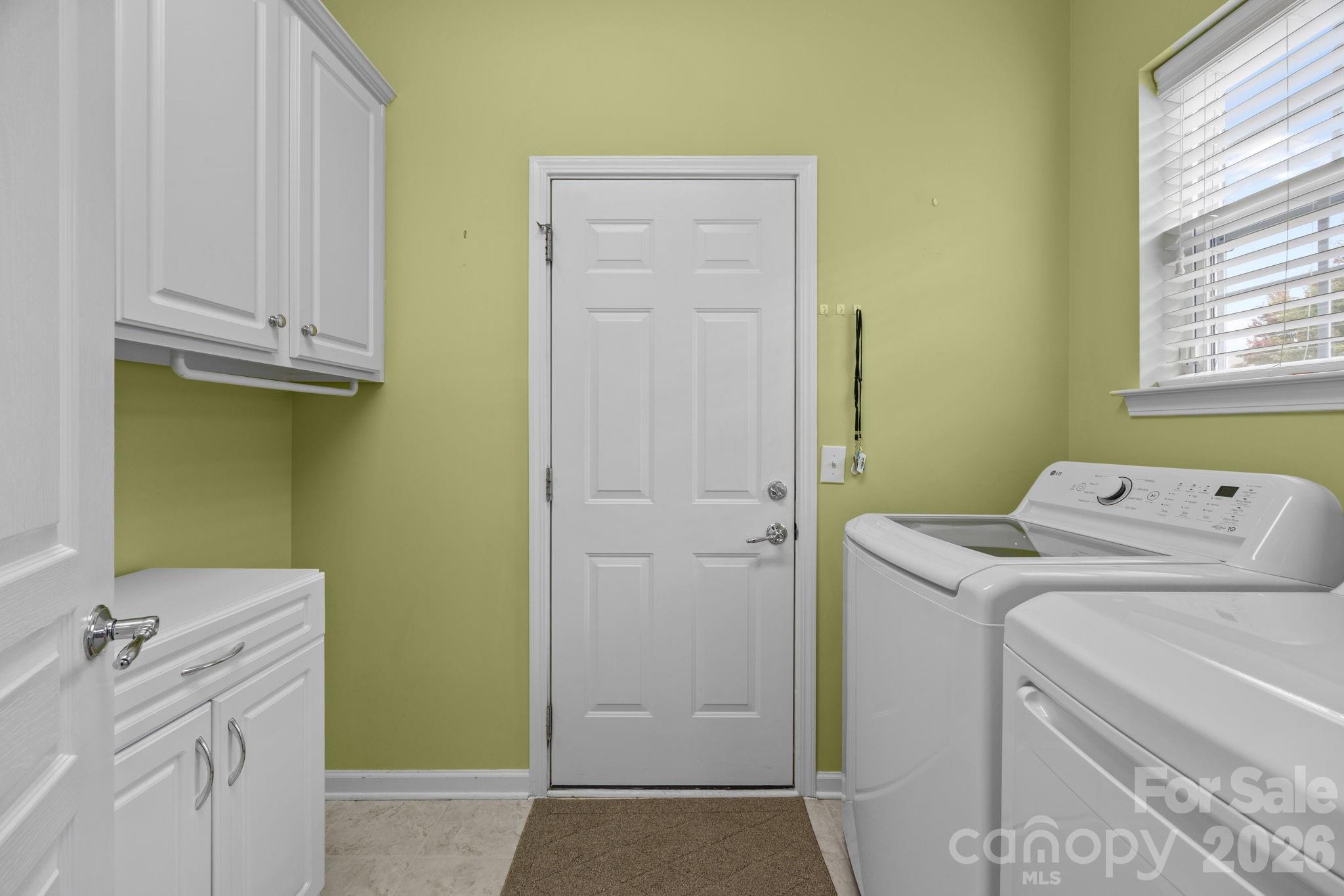 52062 Longspur Lane Fort Mill, SC 29707 - Photo 22 of 31 a utility room with dryer and washer