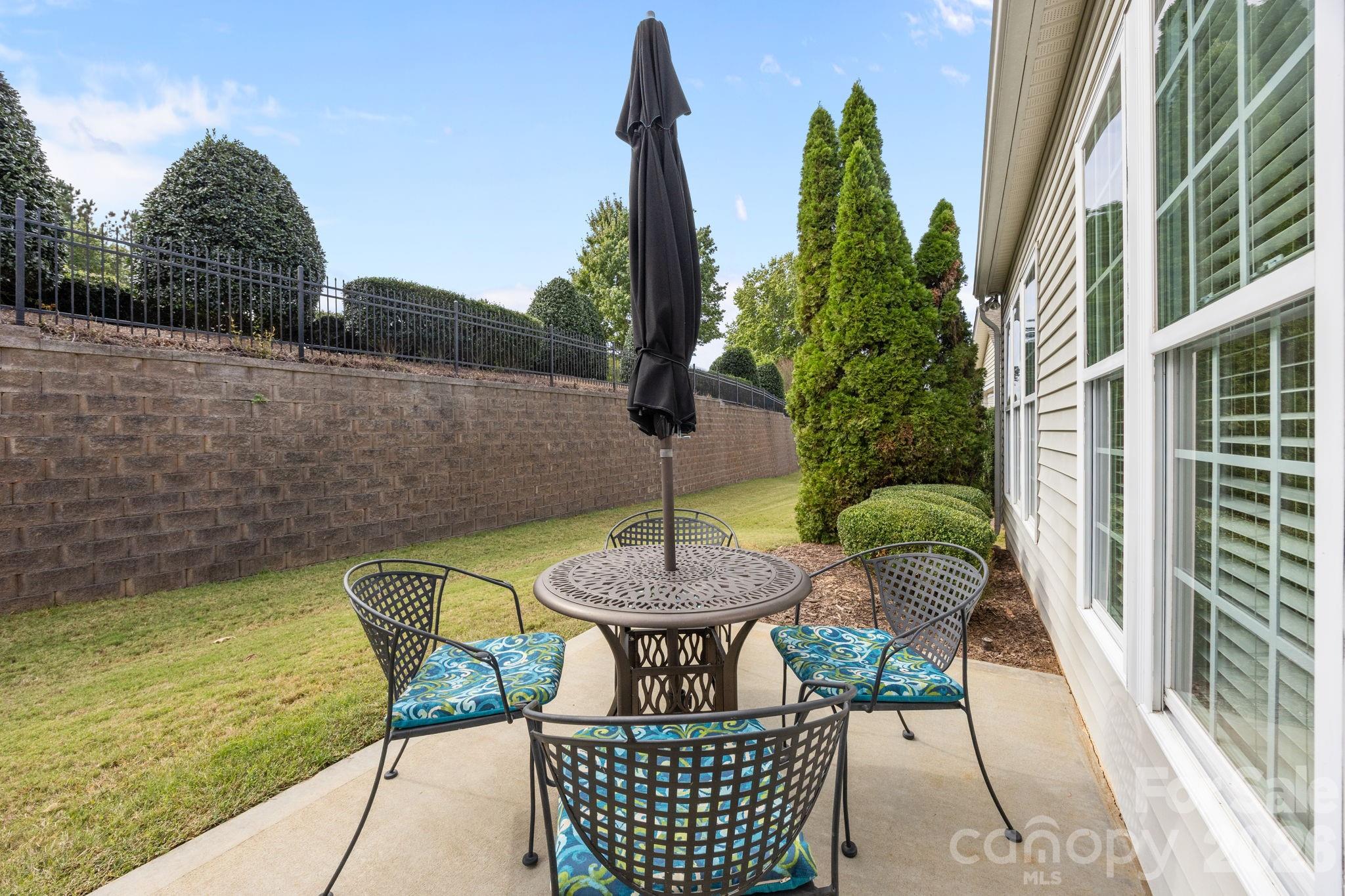 52062 Longspur Lane Fort Mill, SC 29707 - Photo 23 of 31 a view of a patio in backyard