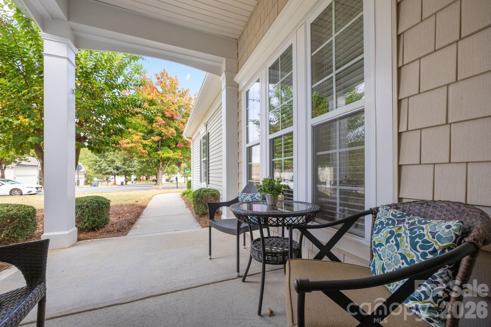 52062 Longspur Lane Fort Mill, SC 29707 - Photo 27 of 31 a balcony view with a table and chairs