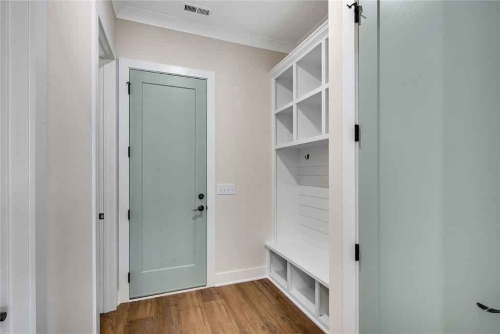 402 Manchester Lane Villa Rica, GA 30180 - Photo 16 of 63 a view of an empty walk in closet