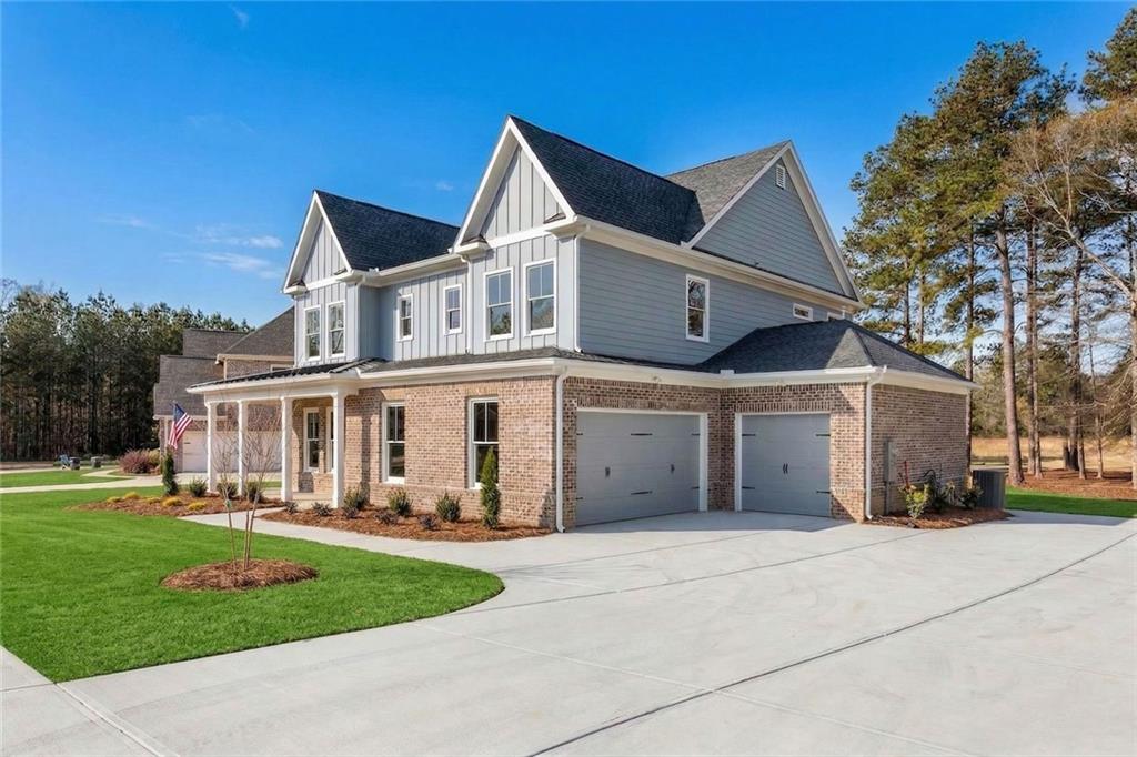 402 Manchester Lane Villa Rica, GA 30180 - Photo 2 of 63 front view of a house with a yard
