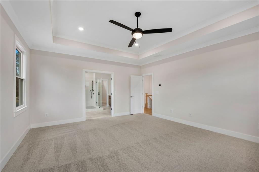 402 Manchester Lane Villa Rica, GA 30180 - Photo 21 of 63 a view of a livingroom with a ceiling fan and window
