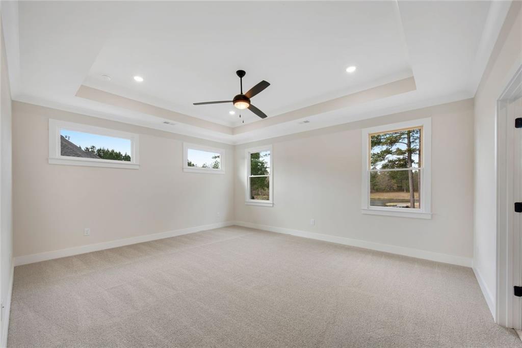 402 Manchester Lane Villa Rica, GA 30180 - Photo 22 of 63 a view of an empty room with a window