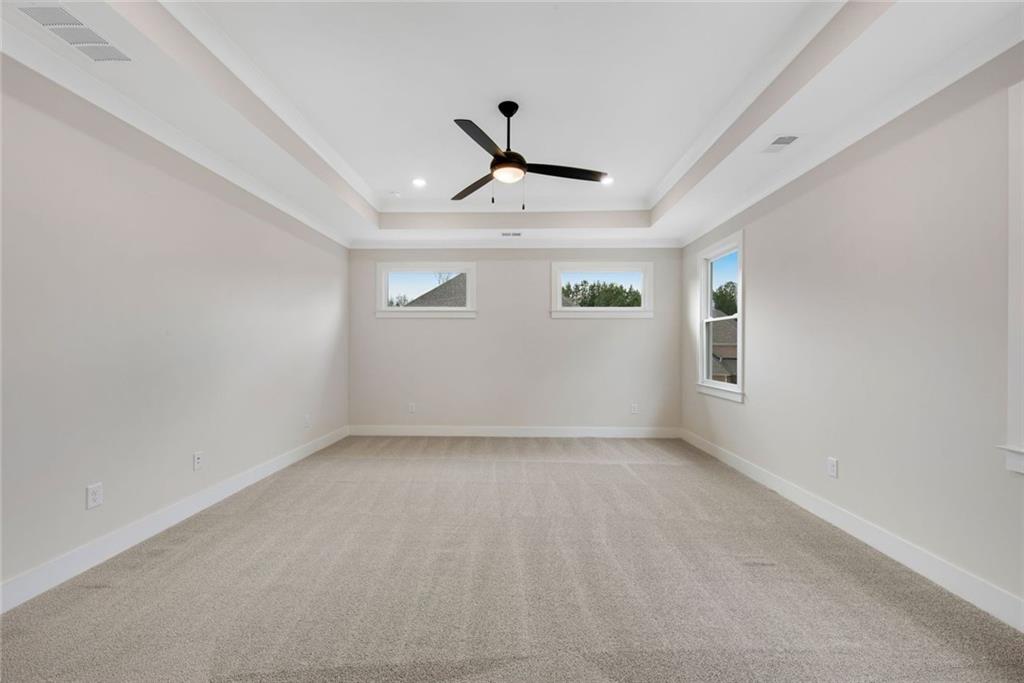 402 Manchester Lane Villa Rica, GA 30180 - Photo 23 of 63 a view of room with window and ceiling fan