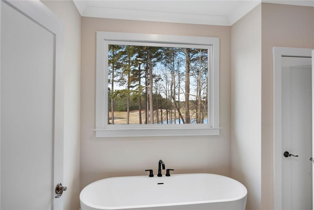 402 Manchester Lane Villa Rica, GA 30180 - Photo 26 of 63 a bathroom with a sink and a window