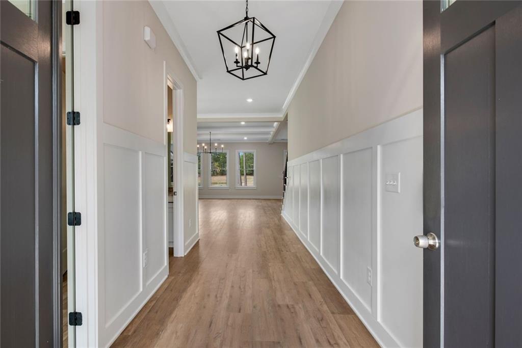 402 Manchester Lane Villa Rica, GA 30180 - Photo 3 of 63 a view of hallway with wooden floor