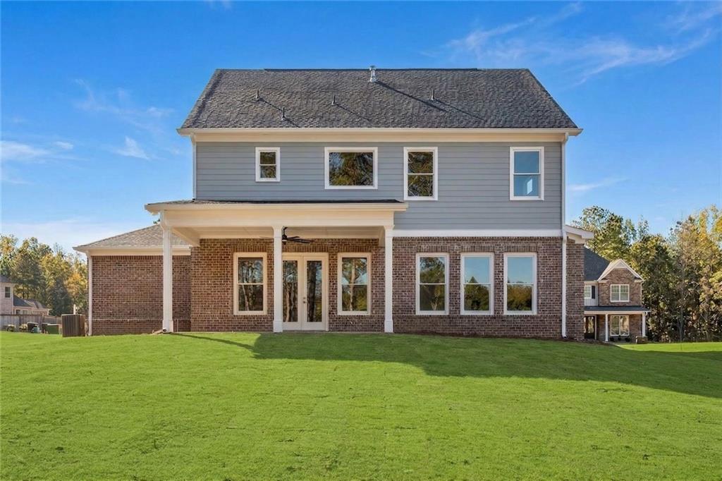 402 Manchester Lane Villa Rica, GA 30180 - Photo 46 of 63 front view of a house with a yard
