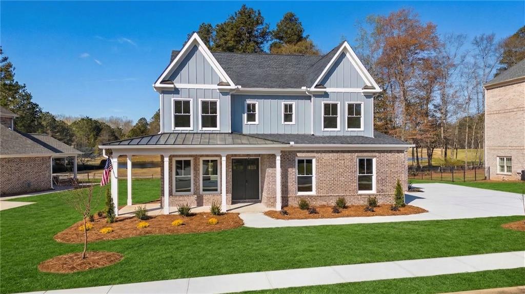 402 Manchester Lane Villa Rica, GA 30180 - Photo 47 of 63 a view of a yard in front of house