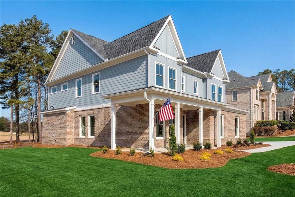 402 Manchester Lane Villa Rica, GA 30180 - Photo 48 of 63 a view of a house with a yard