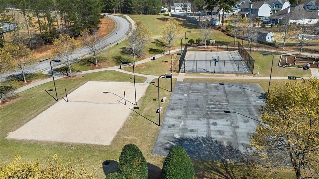 402 Manchester Lane Villa Rica, GA 30180 - Photo 59 of 63 a view of a lake with a building in the background