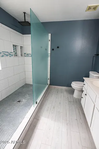 a bathroom with a sink and a toilet