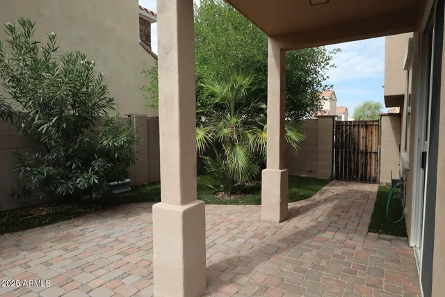 a view of backyard with green space