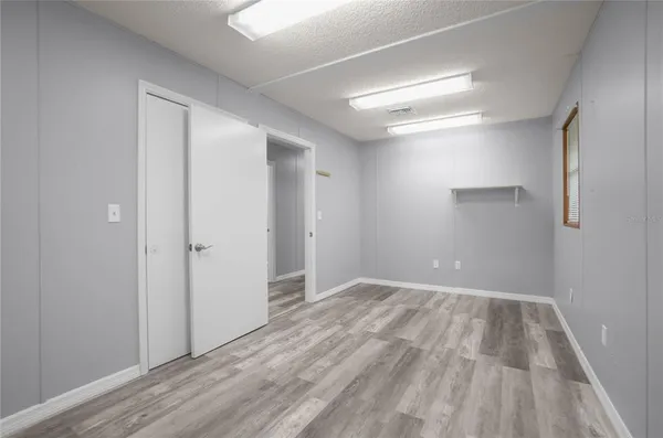 a view of room with hardwood floor