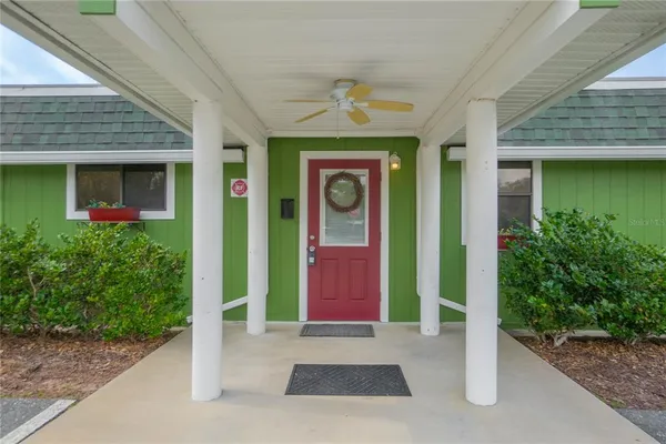 a front view of a house with a porch