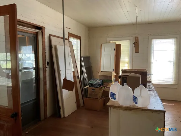 a room with furniture and window