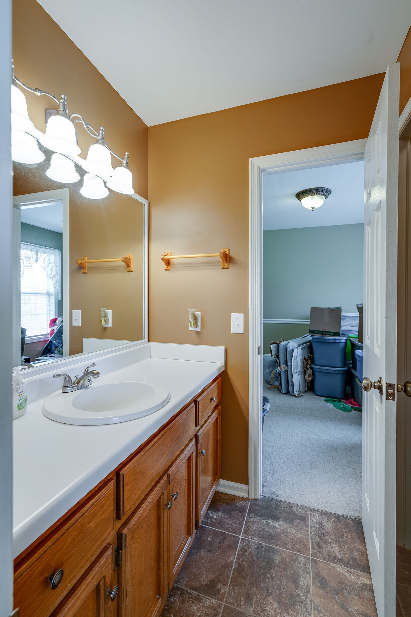 1011 Green Acres Road Joelton, TN 37080 - Photo 22 of 31 a spacious bathroom with a sink and a mirror