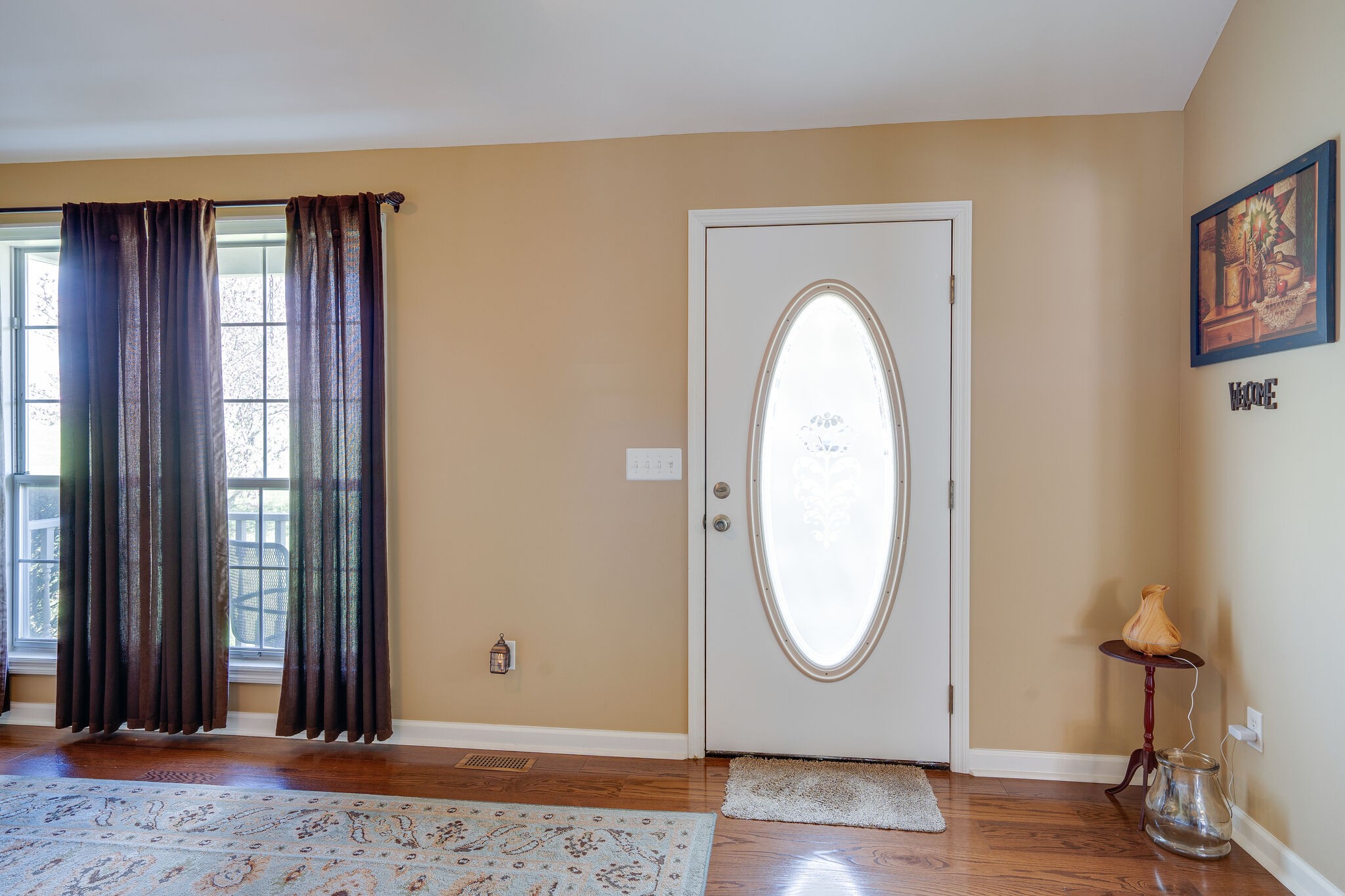 1011 Green Acres Road Joelton, TN 37080 - Photo 6 of 31 a view of a livingroom with wooden floor and a window