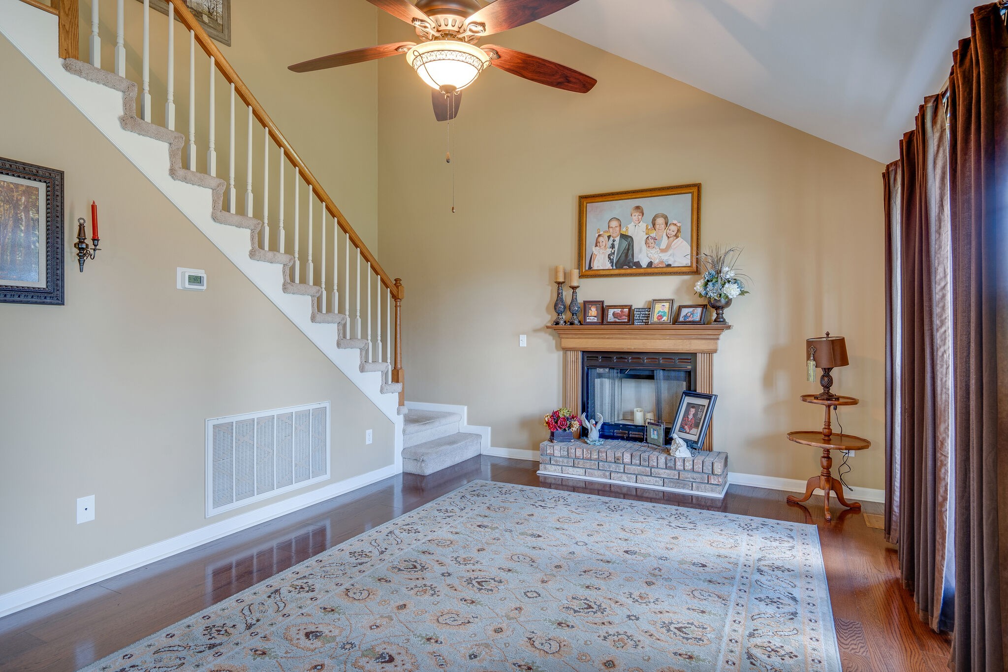 1011 Green Acres Road Joelton, TN 37080 - Photo 7 of 31 a living room with fireplace and a wooden floor
