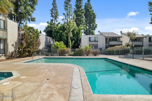 a view of a house with a swimming pool