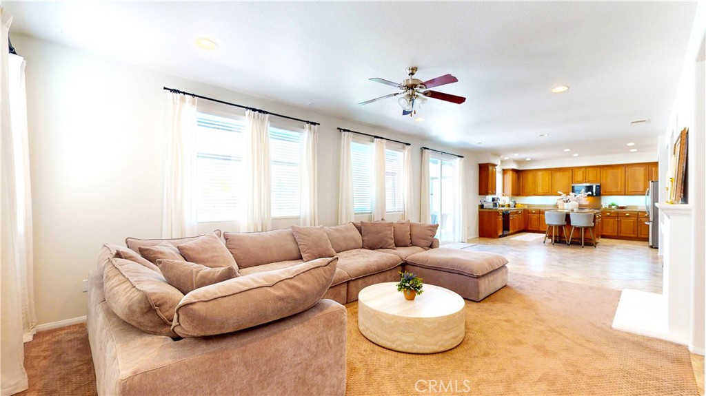 1279 Longbranch Road San Jacinto, CA 92582 - Photo 4 of 35 a living room with furniture and a large window