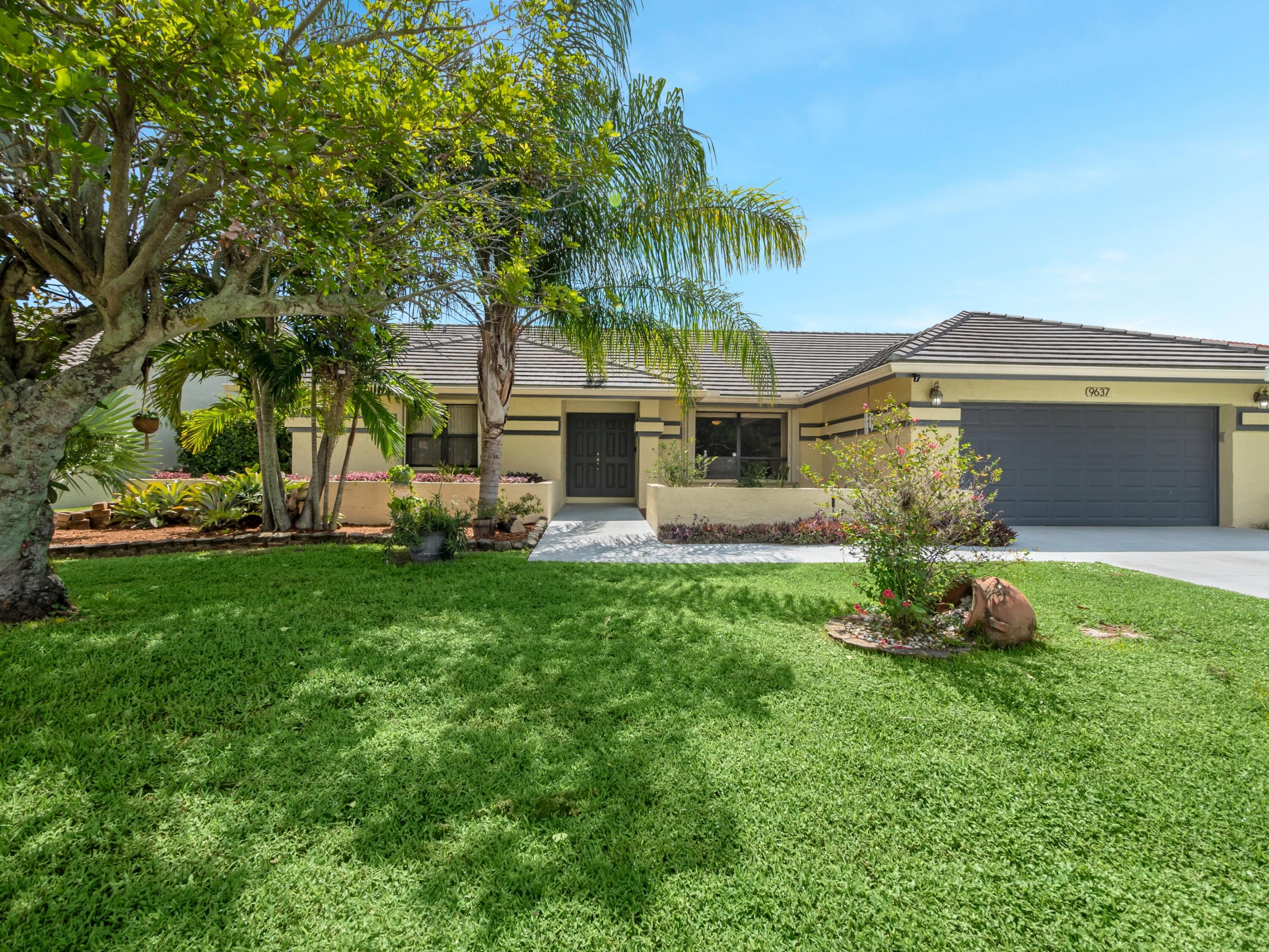 9637 El Clair Ranch Road Boynton Beach, FL 33437 - Photo 1 of 1 Front