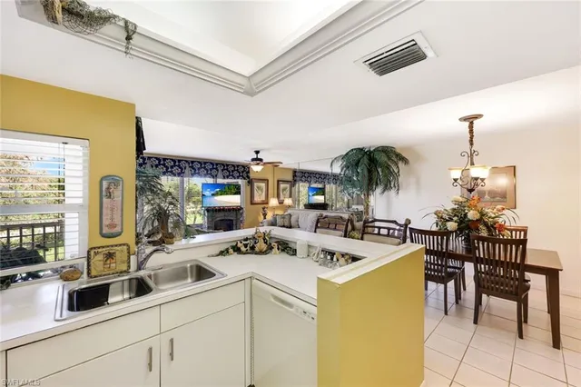 a view of a kitchen counter space and furniture