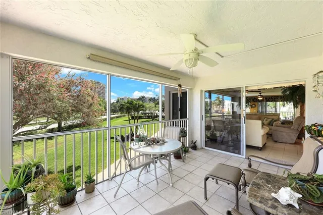 a living room filled with furniture and a garden