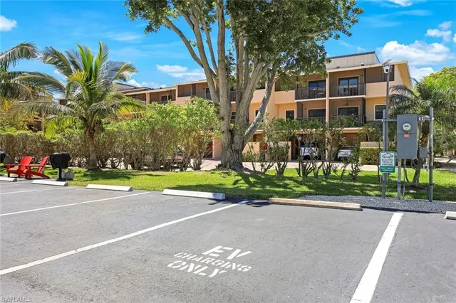 a view of buildings with yard