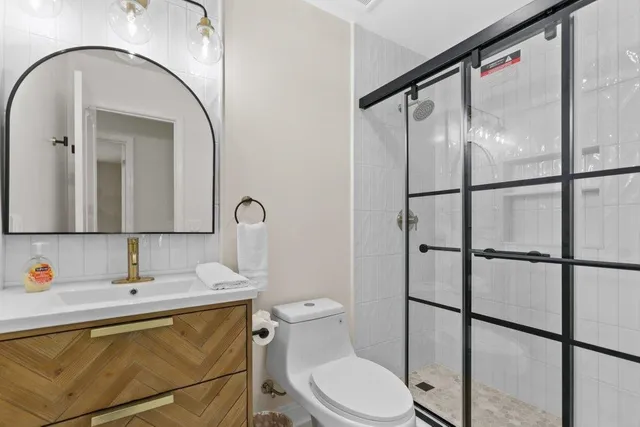 a living room with furniture a rug and a window