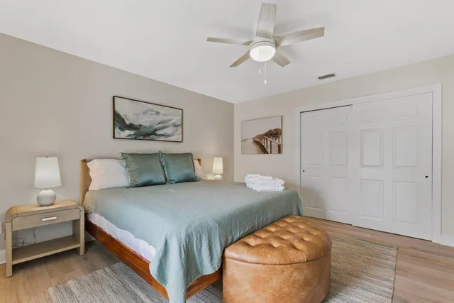 a view of a house with a swimming pool and a yard